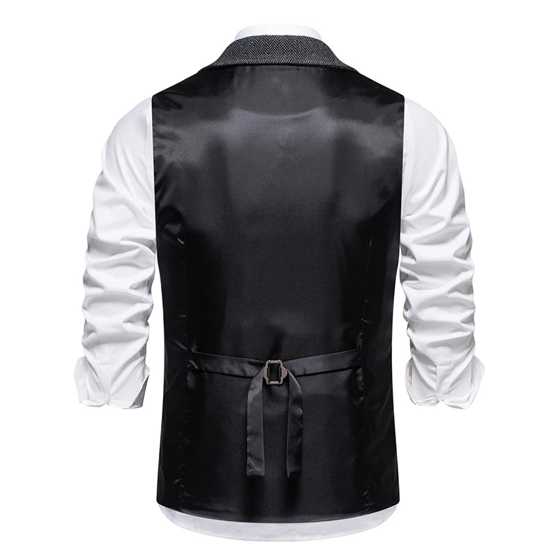 Black vest over a white shirt on a white background