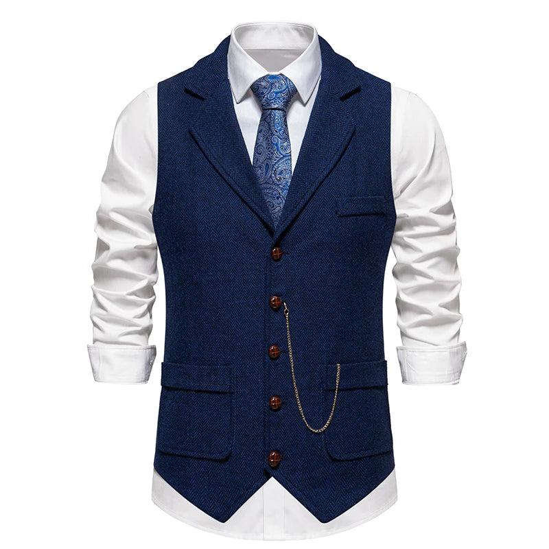 Blue vest with buttons and a tie over a white shirt on a white background